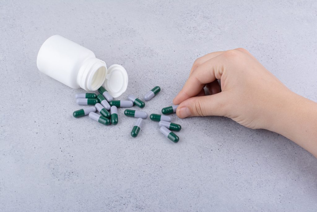 Prescription medication bottle used in a medical weight loss plan